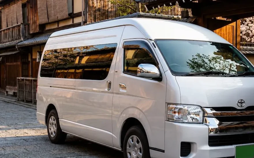 White Toyota Hiace Commuter large van for big groups in Japan